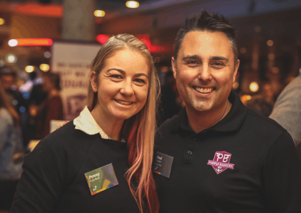 Penny Cula-Reid with Paul Coniglio from Purple Bombers